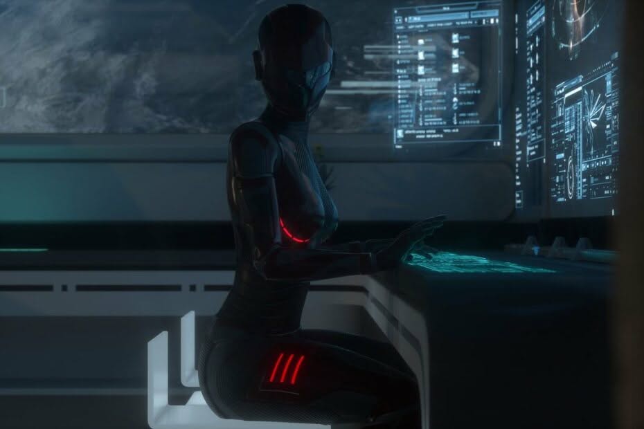 Cyborg seduto davanti a una console tecnologica
